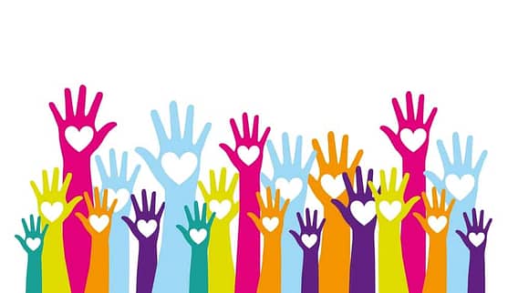 International Human Solidarity Day. Hands up stretching out to those in need. Helping and caring hands.